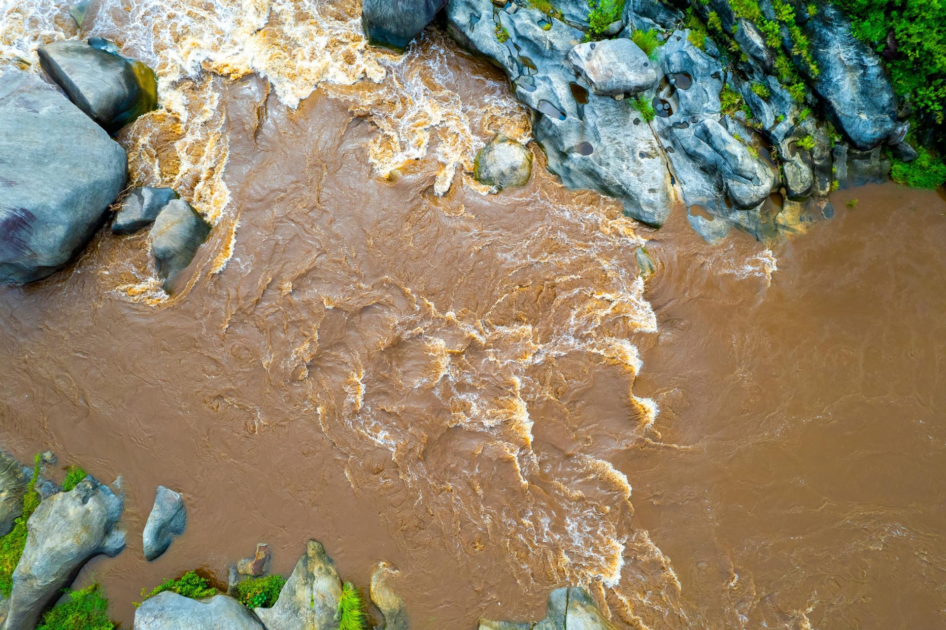 Reading Muddy Waters from Space: The Role of Suspended Sediments in Aquatic Monitoring