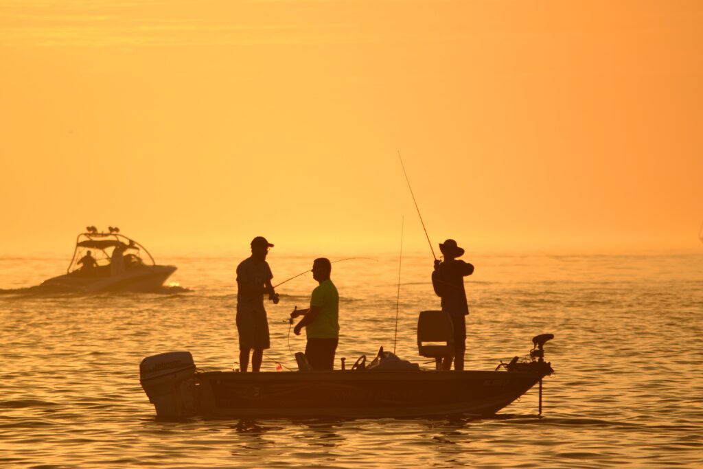 Three Fishermen On Their Boat At Sunset Golden Hou 2026 03 17 17 48 24 Utc
